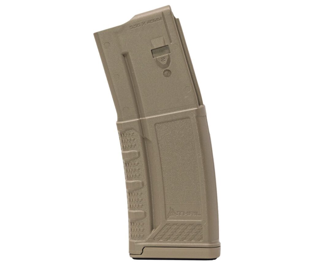 A picture of 0007639 thril usa 556x45mm dark earth polymer 30 round magazine with USA Gun Store