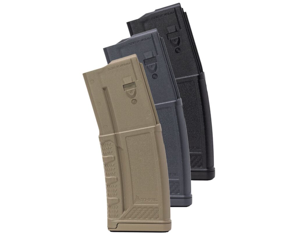 A picture of 0007640 thril usa 556x45mm dark earth polymer 30 round magazine with USA Gun Store