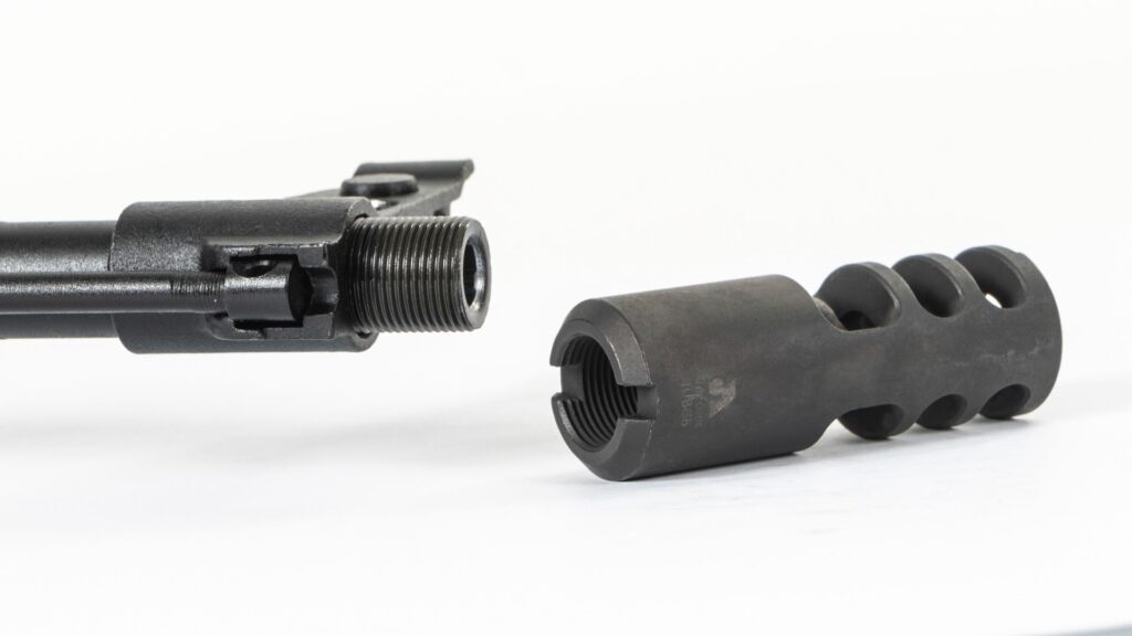 A picture of 0012348 arsenal ak 20 style muzzle brake 762x39 14x1mm lh threads stainless steel with USA Gun Store