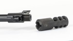 A picture of 0012348 arsenal ak 20 style muzzle brake 762x39 14x1mm lh threads stainless steel with USA Gun Store